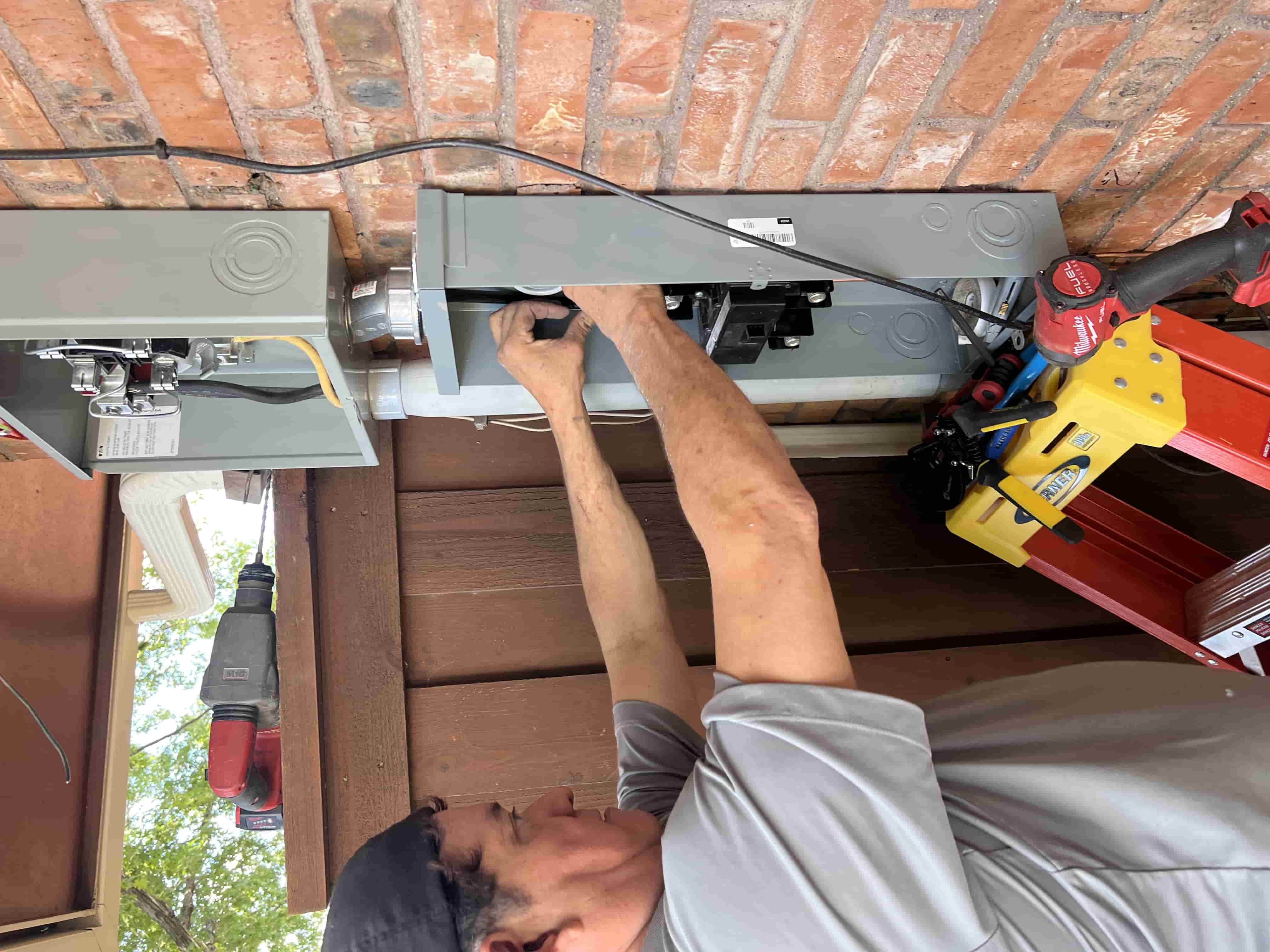 Tradesmen’s Pride electrician completing a clean, safe installation